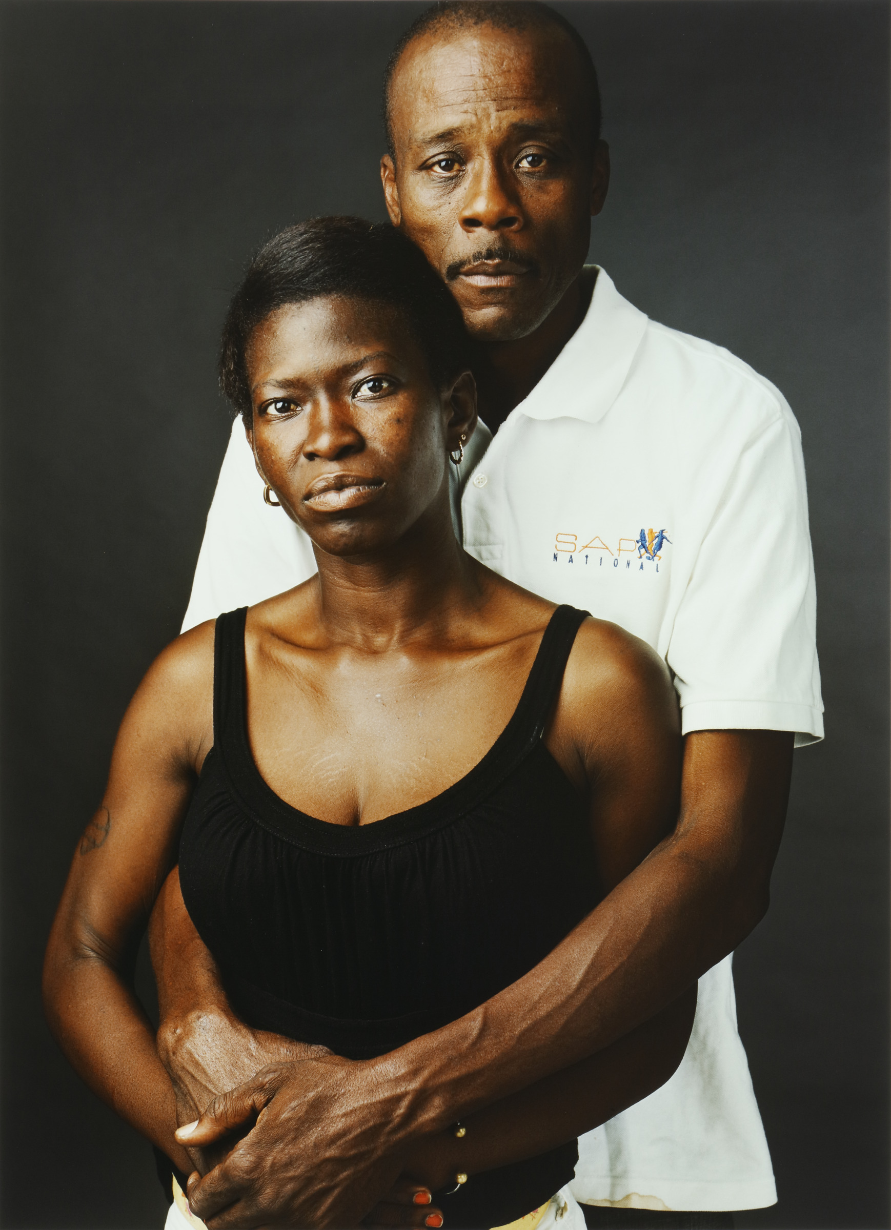 Sharlene and Elliot (b. St. Catherine, Jamaica, 1976) (b. Verona, Italy, 1960) from the Down and Out in the South series