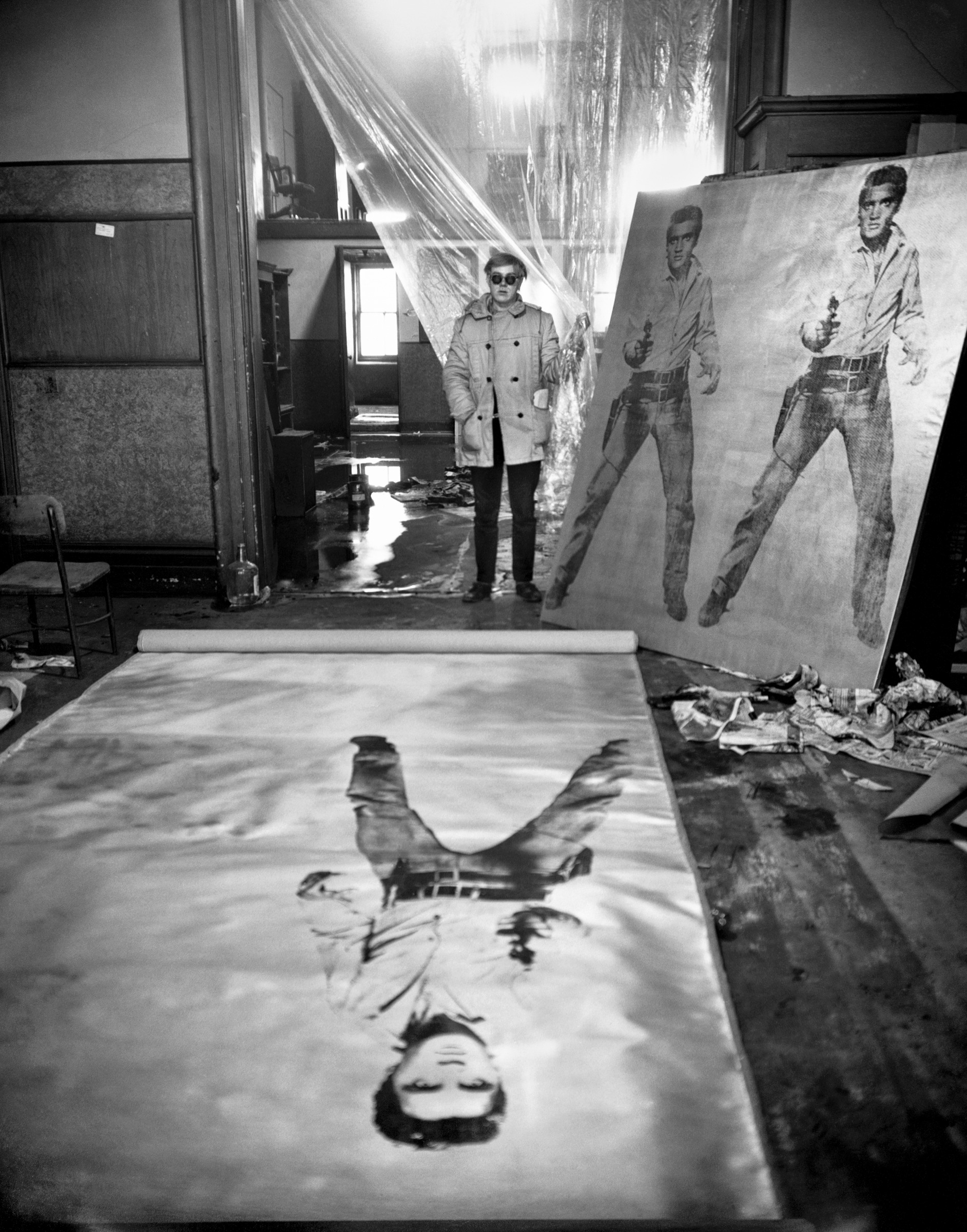 Andy Warhol (in his studio with Elvis Presley print), New York