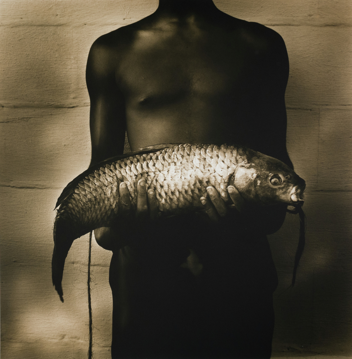 Man with Fish, Como, MS