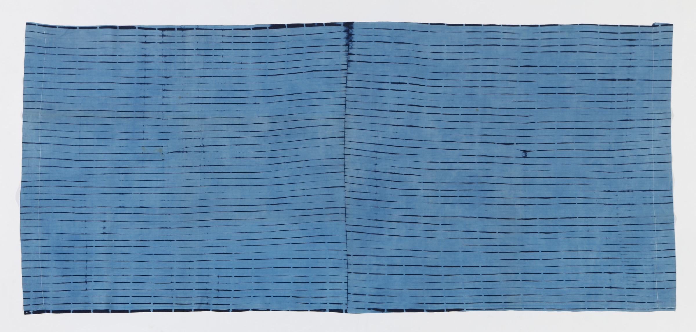 NW27 light bl/indigo adire “Morgan” example