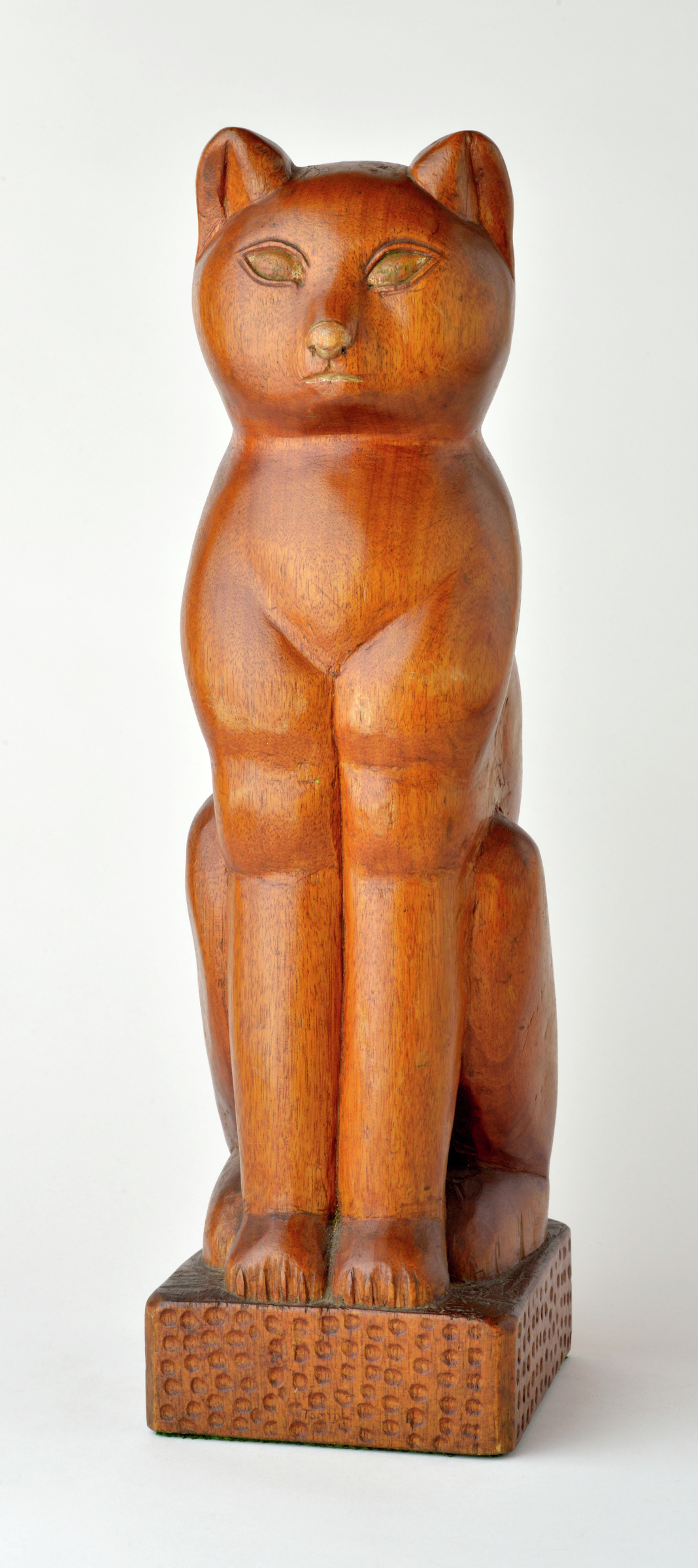 American carved wooden seated cat on base
