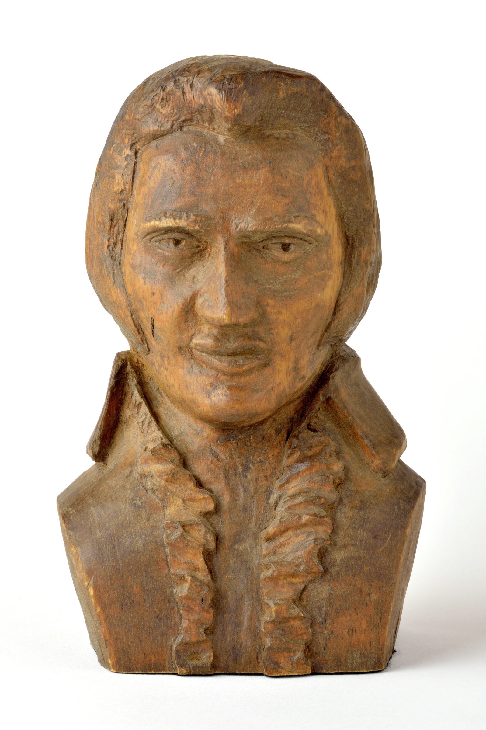 American carved wooden head and shoulder bust portrait depicting Elvis Presley