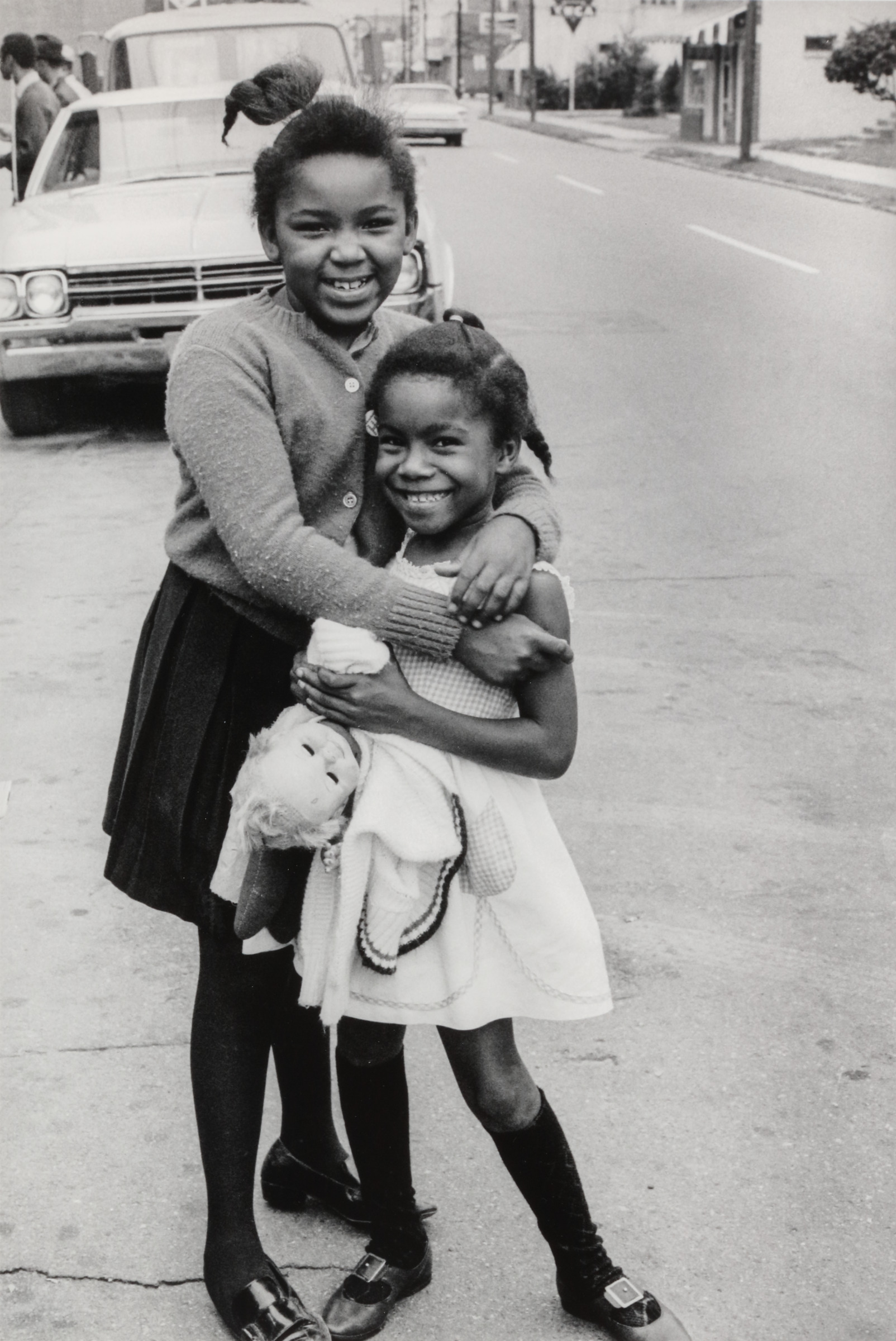 Children with white doll, Farish Street, Jackson, Mississippi