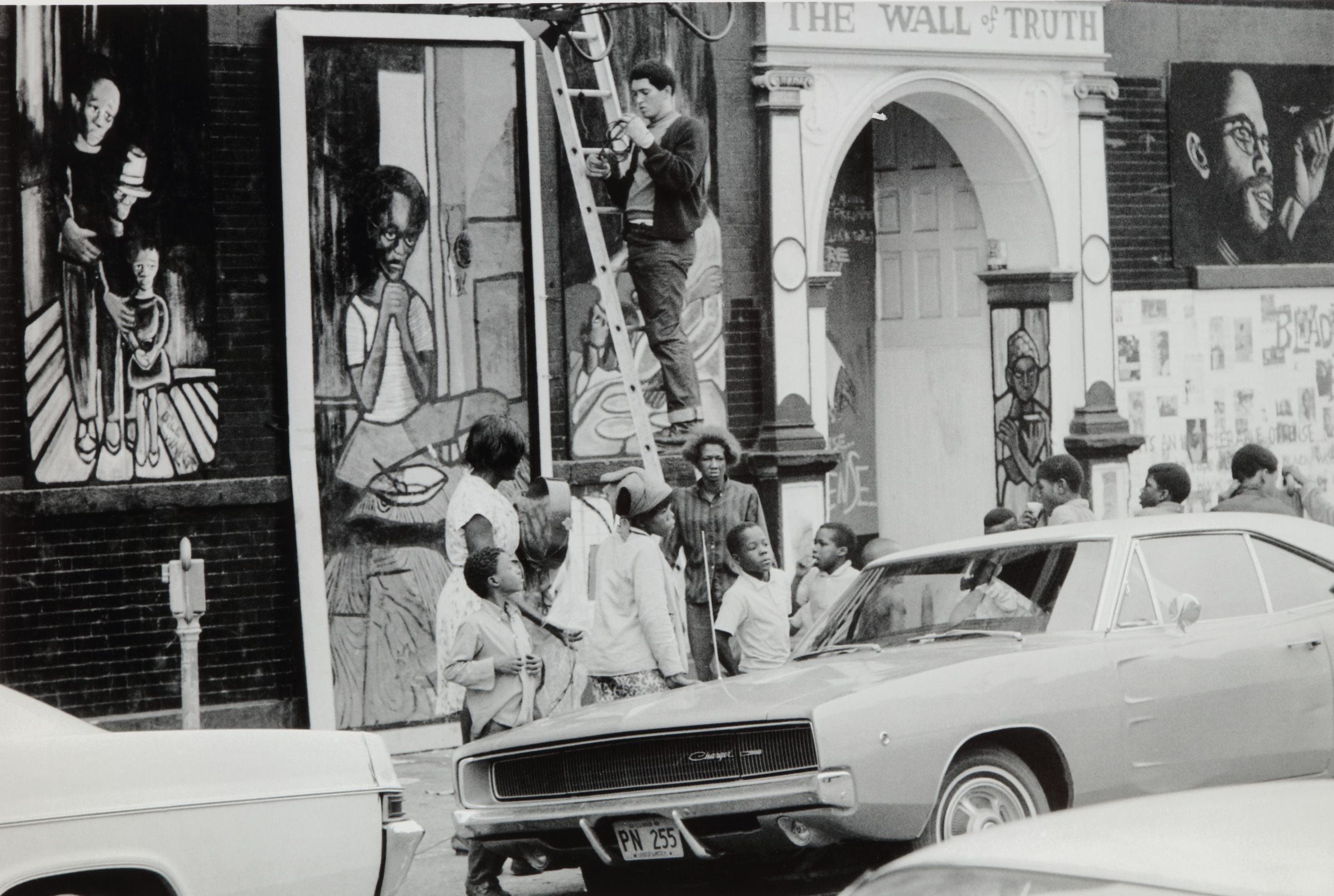 Eugene Wade, artist, working on the Wall of Truth mural, Chicago, Illinois